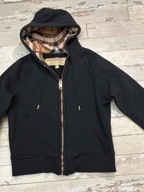 Woman’s Burberry Black Hooded Zip Jacket with Iconic Check Lining